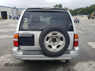 2001 Suzuki XL7 Standard z VIN JS3TX92V814116919, wystawiony jako Copart lot #72758694 z przebiegiem 185 153 mil mil oraz Szkoda całkowita • Salvage title. Historia ofert i sprzedaży dostępna na DreamBid. Obrazek 6.