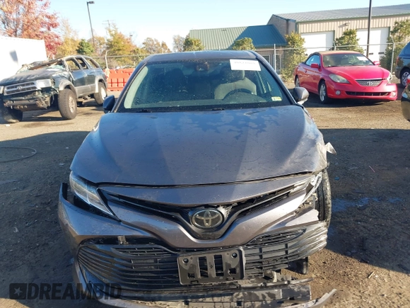 2020 Toyota Camry LE with VIN 4T1C11AKXLU884764, listed as a IAAI auction lot 40821088 with 111,631 mi miles. Bid and sale history available at carsss.com. Image 12.