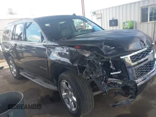 2015 Chevrolet Tahoe LT with VIN 1GNSKBKC3FR212554, listed as a IAAI auction lot 42254845 with 135,752 mi miles and . Bid and sale history available at DreamBid. Image 1.