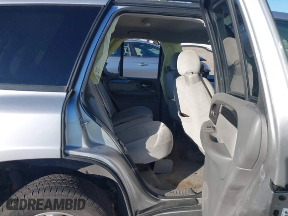 2008 GMC Envoy SLE2 with VIN 1GKDS13S082141895, listed as a IAAI auction lot 41596735 with 174,914 mi miles. Bid and sale history available at carsss.com. Image 8.