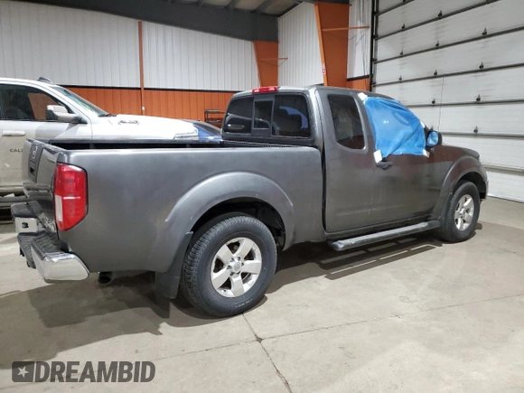 2009 Nissan Frontier SE with VIN 1N6AD06W49C406313, listed as a Copart auction lot 75226554 with 236,606 mi miles and Salvage title. Bid and sale history available at DreamBid. Image 3.