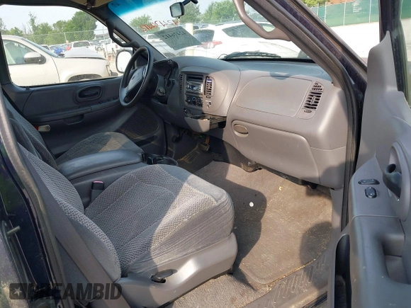 2000 Ford F-150 XL с VIN 2FTZX0722YCA70985, выставлен на аукционе IAAI как лот 42476412 с пробегом 171 033 миль миль и . История ставок и продаж доступна на DreamBid. Изображение 5.