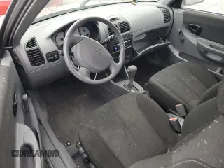 2004 Hyundai Accent GL with VIN KMHCG35C34U279368, listed as a Copart auction lot 50233625 with 104,086 mi miles and Clean Title. Bid and sale history available at carsss.com. Image 8.
