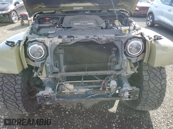 2013 Jeep Wrangler Unlimited Rubicon 10th Anniversary with VIN 1C4HJWFG4DL549065, listed as a Copart auction lot 75899594 with 127,960 mi miles and Salvage title. Bid and sale history available at DreamBid. Image 11.
