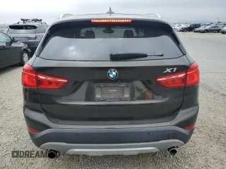 2018 BMW X1 xDrive28i с VIN WBXHT3C30J5K29979, выставлен на аукционе Copart как лот 58662505 с пробегом 61 461 миль миль и Списание • Salvage title. История ставок и продаж доступна на DreamBid. Изображение 6.