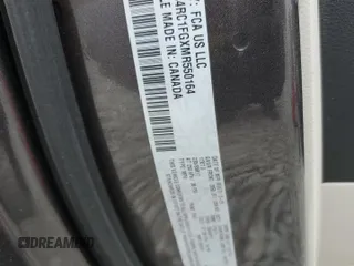 2021 Chrysler Pacifica Touring with VIN 2C4RC1FGXMR550164, listed as a Copart auction lot 57297585 with 10,222 mi miles and Salvage title. Bid and sale history available at DreamBid. Image 14.