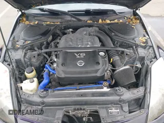 2005 Nissan 350Z Enthusiast z VIN JN1AZ34D25M605438, wystawiony jako IAAI lot #42131179 z przebiegiem 143 157 mil mil oraz . Historia ofert i sprzedaży dostępna na DreamBid. Obrazek 10.