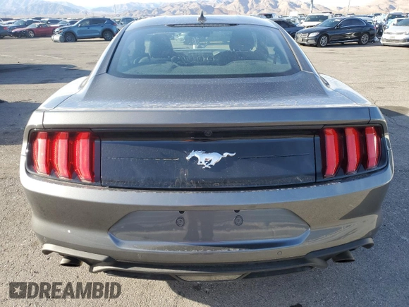 2022 Ford Mustang EcoBoost with VIN 1FA6P8TH0N5150731, listed as a Copart auction lot 48002265 with 2,615 mi miles and Salvage Title. Bid and sale history available at carsss.com. Image 6.