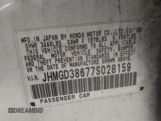 2007 Honda Fit Sport with VIN JHMGD38677S028159, listed as a IAAI auction lot 41960438 with 164,212 mi miles. Bid and sale history available at carsss.com. Image 9.
