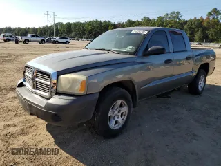 2005 Dodge Dakota ST z VIN 1D7HE28K35S119717, wystawiony jako Copart lot #46087815 z przebiegiem 247 082 mil mil oraz Szkoda całkowita • Salvage title. Historia ofert i sprzedaży dostępna na DreamBid. Obrazek 1.