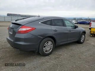 2012 Honda Crosstour EX-L z VIN 5J6TF3H56CL001664, wystawiony jako Copart lot #49851405 z przebiegiem 193 147 mil mil oraz Szkoda całkowita • Salvage title. Historia ofert i sprzedaży dostępna na DreamBid. Obrazek 3.