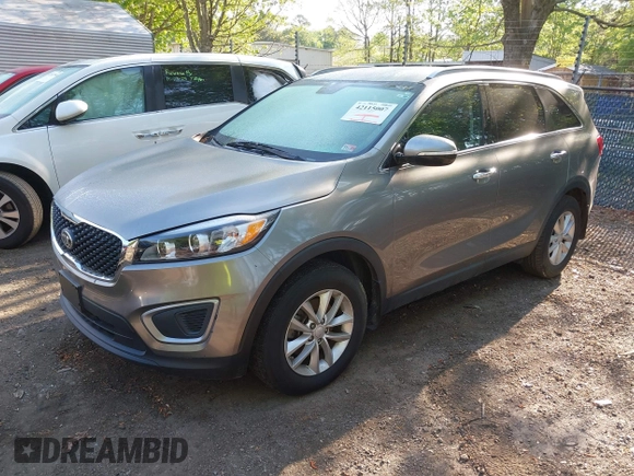 2017 Kia Sorento LX with VIN 5XYPG4A36HG279857, listed as a IAAI auction lot 42115007 with 112,592 mi miles. Bid and sale history available at carsss.com. Image 17.