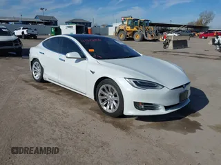 2020 Tesla Model S Long Range with VIN 5YJSA1E23LF360441, listed as a IAAI auction lot 41312865 with 68,967 mi miles. Bid and sale history available at carsss.com. Image 1.