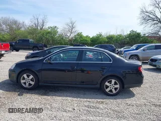 2009 Volkswagen Jetta Sedan SE with VIN 3VWRM71K79M131020, listed as a IAAI auction lot 42096465 with 316,631 mi miles. Bid and sale history available at carsss.com. Image 14.