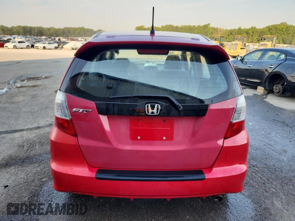 2009 Honda Fit Sport z VIN JHMGE88479S055924, wystawiony jako Copart lot #67186495 z przebiegiem 65 984 mil mil oraz Szkoda całkowita • Salvage title. Historia ofert i sprzedaży dostępna na DreamBid. Obrazek 6.