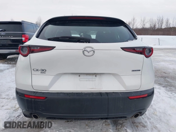 2021 Mazda CX-30 S with VIN 3MVDMBAL9MM221639, listed as a IAAI auction lot 41545920 with 57,239 mi miles and . Bid and sale history available at carsss.com. Image 17.