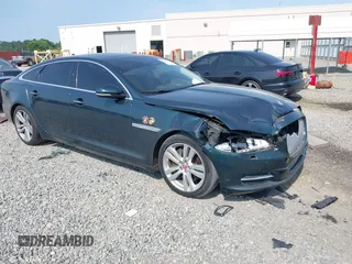 2014 Jaguar XJ Portfolio with VIN SAJWA2GZ4E8V60315, listed as a IAAI auction lot 42293880 with 97,712 mi miles and . Bid and sale history available at DreamBid. Image 1.