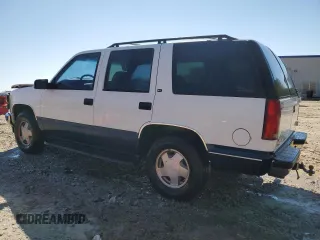 1997 GMC Yukon with VIN 1GKEK13R0VJ747359, listed as a Copart auction lot 48301095 with 272,417 mi miles and Salvage Title. Bid and sale history available at carsss.com. Image 2.