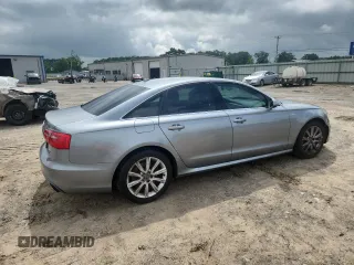 2012 Audi A6 Prestige with VIN WAUJGAFC2CN070787, listed as a Copart auction lot 60617945 with 193,589 mi miles and Salvage title. Bid and sale history available at DreamBid. Image 3.