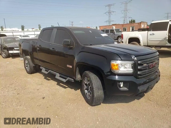 2015 GMC Canyon 4WD SLE with VIN 1GTG6BE31F1121425, listed as a Copart auction lot 67322994 with 112,435 mi miles and Salvage Title. Bid and sale history available at carsss.com. Image 11.