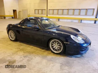 1999 Porsche Boxster z VIN WP0CA2983XU630435, wystawiony jako Copart lot #47402785 z przebiegiem 62 180 mil mil oraz Szkoda całkowita • Salvage title. Historia ofert i sprzedaży dostępna na DreamBid. Obrazek 4.