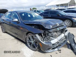 2018 BMW 4 Series 440i with VIN WBA4J5C51JBF07174, listed as a IAAI auction lot 41532904 with 63,745 mi miles and . Bid and sale history available at carsss.com. Image 1.