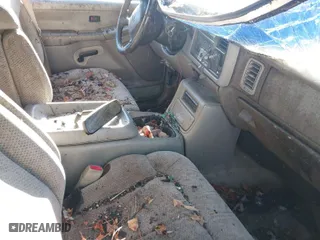 1999 Chevrolet Silverado 1500 LS with VIN 2GCEK19T9X1228693, listed as a IAAI auction lot 41317137 with 200,000 mi miles. Bid and sale history available at carsss.com. Image 5.