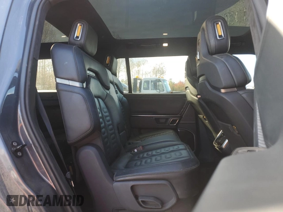 2022 Rivian R1S Launch Edition with VIN 7PDSGABL1NN000514, listed as a Copart auction lot 77444184 with 29,490 mi miles and Salvage Title. Bid and sale history available at DreamBid. Image 10.