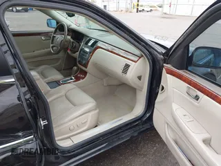 2006 Cadillac DTS w/1SC with VIN 1G6KD57Y96U251691, listed as a IAAI auction lot 41086147 with 128,959 mi miles. Bid and sale history available at carsss.com. Image 5.