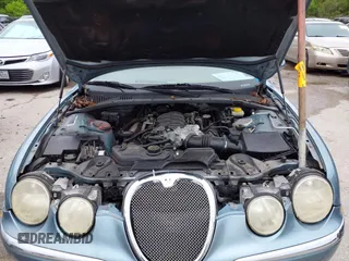 2003 Jaguar S-Type with VIN SAJEA01U33HM70079, listed as a IAAI auction lot 41939388 with 147,975 mi miles and . Bid and sale history available at DreamBid. Image 10.
