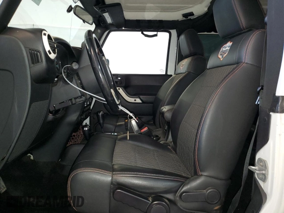 2012 Jeep Wrangler Arctic with VIN 1C4AJWBG4CL146788, listed as a Copart auction lot 75648234 with 100,879 mi miles and Clean title. Bid and sale history available at DreamBid. Image 7.