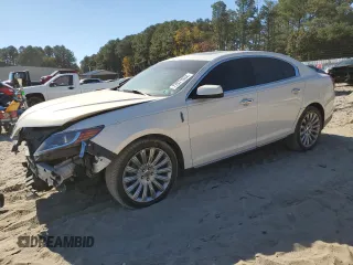 2013 Lincoln MKS z VIN 1LNHL9DK0DG605400, wystawiony jako Copart lot #77071034 z przebiegiem 73 450 mil mil oraz Szkoda całkowita • Salvage title. Historia ofert i sprzedaży dostępna na DreamBid. Obrazek 1.