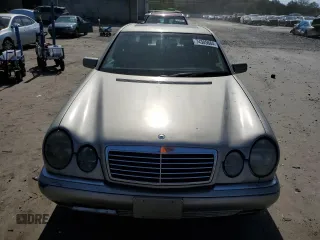1997 Mercedes-Benz E-Class with VIN WDBJF55F8VJ031008, listed as a Copart auction lot 74305684 with 308,905 mi miles and Clean Title. Bid and sale history available at carsss.com. Image 5.