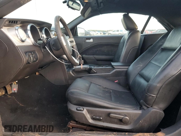 2009 Ford Mustang with VIN 1ZVHT84N495121741, listed as a Copart auction lot 85447264 with 165,247 mi miles and Salvage title. Bid and sale history available at DreamBid. Image 7.