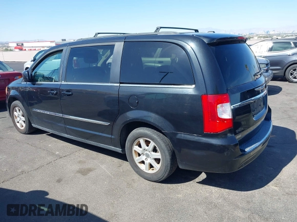 2011 Chrysler Town & Country Touring with VIN 2A4RR5DG2BR702731, listed as a IAAI auction lot 42095661 with 202,968 mi miles and . Bid and sale history available at DreamBid. Image 3.