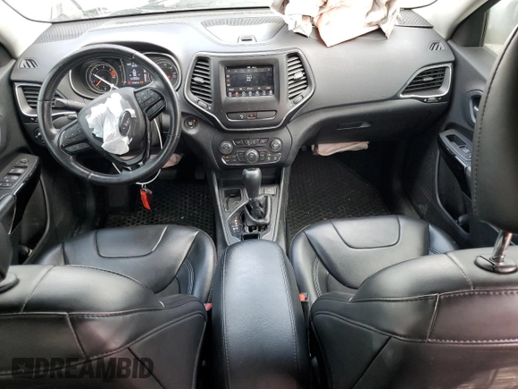 2020 Jeep Cherokee Latitude Plus with VIN 1C4PJLLBXLD561068, listed as a Copart auction lot 53815785 with 179,449 mi miles and Salvage title. Bid and sale history available at DreamBid. Image 8.