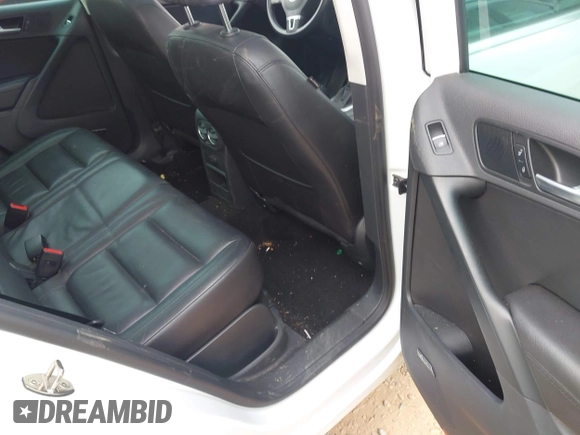 2016 Volkswagen Tiguan S with VIN WVGBV7AXXGW585445, listed as a IAAI auction lot 42083377 with 111,011 mi miles and . Bid and sale history available at DreamBid. Image 8.