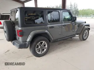 2019 Jeep Wrangler Unlimited Sahara with VIN 1C4HJXEN0KW540591, listed as a IAAI auction lot 42076235 with 41,016 mi miles and . Bid and sale history available at DreamBid. Image 4.