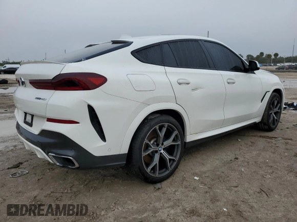 2021 BMW X6 sDrive40i z VIN 5UXCY4C08M9F34312, wystawiony jako Copart lot #87206474 z przebiegiem 67 851 mil mil oraz Czysty tytuł • Clean title. Historia ofert i sprzedaży dostępna na DreamBid. Obrazek 3.