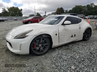 2013 Nissan 370Z with VIN JN1AZ4EH2DM381951, listed as a Copart auction lot 73913174 with 71,583 mi miles and Salvage Title. Bid and sale history available at carsss.com. Image 1.