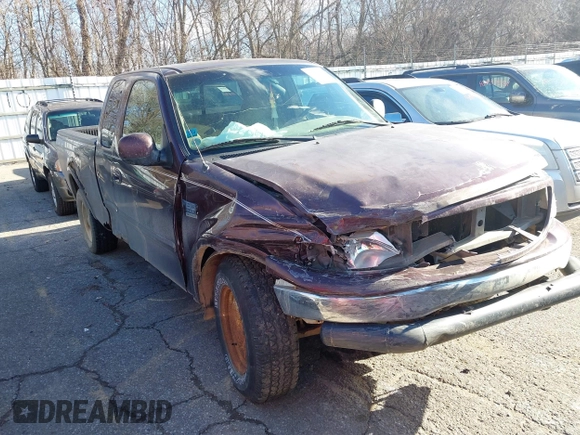 2000 Ford F-150 XL with VIN 1FTRX18W7YNA15739, listed as a IAAI auction lot 40954299 with 218,018 mi miles and . Bid and sale history available at DreamBid. Image 1.