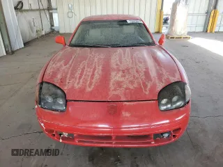 1999 Mitsubishi 3000GT z VIN JA3AM44H3XY001394, wystawiony jako Copart lot #75942814 z przebiegiem 75 146 mil mil oraz Tytuł czysty. Historia ofert i sprzedaży dostępna na DreamBid. Obrazek 5.