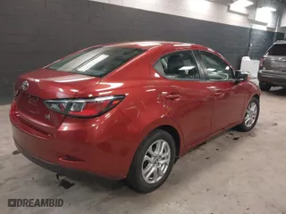 2018 Toyota Yaris iA with VIN 3MYDLBYV0JY315135, listed as a IAAI auction lot 41284774 with 64,561 mi miles. Bid and sale history available at carsss.com. Image 4.
