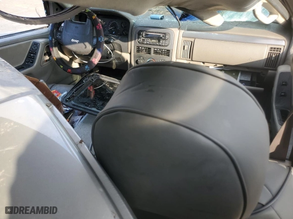 2004 Jeep Grand Cherokee Laredo with VIN 1J4GX48SX4C320531, listed as a Copart auction lot 86958484 with 225,769 mi miles and Clean Title. Bid and sale history available at carsss.com. Image 8.