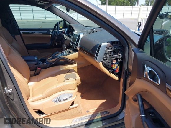 2012 Porsche Cayenne Turbo with VIN WP1AC2A21CLA82667, listed as a IAAI auction lot 42383728 with 133,134 mi miles and . Bid and sale history available at DreamBid. Image 5.