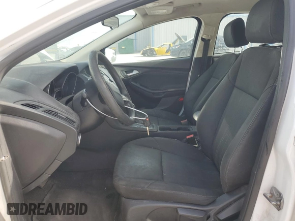 2015 Ford Focus SE with VIN 1FADP3F2XFL220072, listed as a Copart auction lot 58058255 with 128,871 mi miles and Clean title. Bid and sale history available at DreamBid. Image 7.