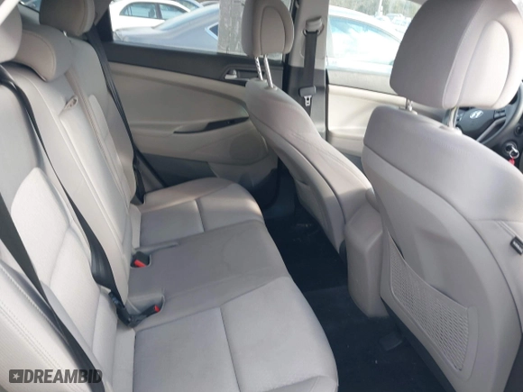 2016 Hyundai Tucson SE with VIN KM8J3CA44GU254260, listed as a IAAI auction lot 41328567 with 124,554 mi miles. Bid and sale history available at carsss.com. Image 8.