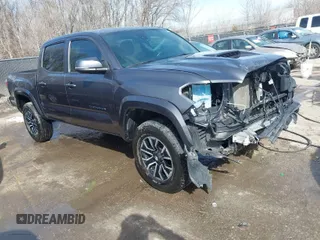 2021 Toyota Tacoma SR z VIN 3TMCZ5AN0MM392247, wystawiony jako IAAI lot #41645989 z przebiegiem 48 029 mil mil oraz . Historia ofert i sprzedaży dostępna na DreamBid. Obrazek 1.