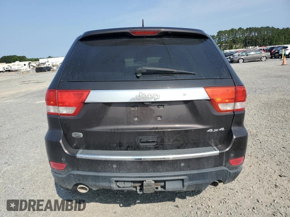 2011 Jeep Grand Cherokee Overland Summit with VIN 1J4RR6GT3BC686143, listed as a Copart auction lot 59218685 with 155,059 mi miles and Salvage title. Bid and sale history available at DreamBid. Image 6.