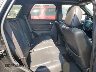 2010 Ford Escape Limited z VIN 1FMCU9E74AKC63136, wystawiony jako Copart lot #62388655 z przebiegiem 156 914 mil mil oraz Szkoda całkowita • Salvage title. Historia ofert i sprzedaży dostępna na DreamBid. Obrazek 11.